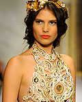 A model displays a creation by Dominican designer Giannina Azar during the Dominicana Moda Fashion Week in Santo Domingo