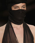 A model presents a creation from Alexandre Herchcovitch's collection during Fashion Rio Summer 2012/2013 in Rio de Janeiro