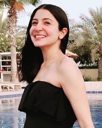 Anushka Sharma Flaunts Her Baby Bump As She Poses in a Pool in Black Monokini