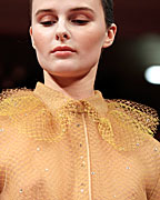 A model presents a creation by French designer Alexis Mabille as part of his Haute Couture Spring Summer 2013 fashion show in Paris