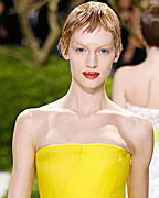 A model presents a creation by Belgian designer Raf Simons as part of his Haute Couture Spring Summer 2013 fashion show for French house Dior in Paris