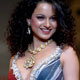 Kangana Ranaut presents a creation by Indian designers Prriya and Chintans at the Wills Lifestyle India Fashion Week