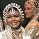 Models display creations from Indian fashion designer Rohit Bal during week-long fashion shows in New Delhi.