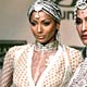 Models display creations from Indian fashion designer Rohit Bal during week-long fashion shows in New Delhi.