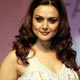 Preity Zinta showcases a new creation by designer Manish Malhotra during India fashion week 