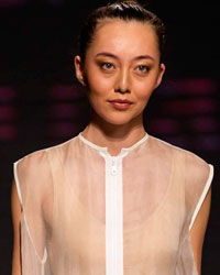 A model presents a creation by Kazakhstan's designer Aya Bapani during Kazakhstan Fashion Week in Almaty