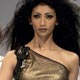 Models present creations from Indian designers Falguni and Shane Peacock during Kolkata Fashion Week