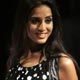 Mahi Gill presents a creation from Indian designer Manoviraj Khosla during Kolkata Fashion Week