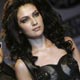 Models present creations from Indian designer Narendra Kumar during Kolkata Fashion Week