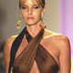 A model walks down the runway wearing Shay Todd swimwear during Swim Shows Miami at the Raleigh Hotel on Miami Beach.