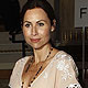 British actress Minnie Driver poses for photographers before the presentation of the Temperley 2012 Autumn/Winter collection during London Fashion Week