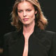 Czech supermodel Eva Herzigova wears an outfit by Giles from his Autumn/Winter 2005/2006 collection during London Fashion Week.