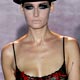 A models displays a lingerie outfit by Andres Sarda during the Pasarela Cibeles in Madrid