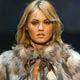 A model wears a fur coat created by Spanish Charo Carrillo Furriery during the International Fashion Week in Madrid.