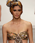 Models present a creation by Mexican designers Pineda and Covalin at Mexico City-13 Nov