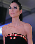 A model presents a creation by Rafeef Al-Saleh at Amman-08 Nov