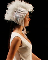 A model presents a creation by designer Selma State as part of her Spring/Summer 2014 collection during Mercedes-Benz Fashion Week in Istanbul