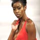 A model displays a creation designed by Naudica Williams on the first day of Miami Fashion Week in Florida