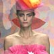 A model presents a creation as part of Agatha Ruiz de la Prada Spring/Summer 2005 women's collection in Milan.