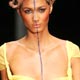 Model displays creation by Italian design house Krizia during Spring/Summer 2006 Milan Fashion Week.