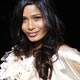 Freida Pinto poses for the photographers before Dolce & Gabbana Fall/Winter 2009/10 women`s collection during Milan Fashion Week