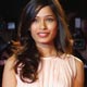 Freida Pinto arrives on the red carpet during an event at Milan Fashion Week