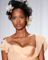 A model presents a creation from the Zac Posen Spring/Summer 2014 collection during New York Fashion Week