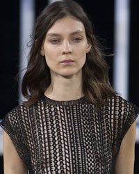 A model presents a creation from the Alexander Wang Spring/Summer 2014 collection during Fashion Week in New York