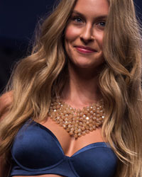 A model presents a creation from the GS Shop Lingerie Show featuring Wonderbra, Anna Sui and Spanx Fall 2014 collections during New York Fashion Week