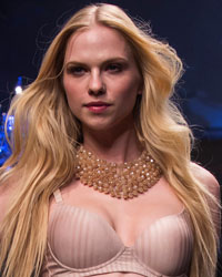 A model presents a creation from the GS Shop Lingerie Show featuring Wonderbra, Anna Sui and Spanx Fall 2014 collections during New York Fashion Week