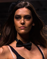 A model presents a creation from the GS Shop Lingerie Show featuring Wonderbra, Anna Sui and Spanx Fall 2014 collections during New York Fashion Week