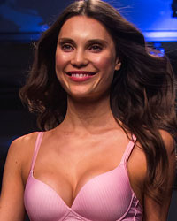 A model presents a creation from the GS Shop Lingerie Show featuring Wonderbra, Anna Sui and Spanx Fall 2014 collections during New York Fashion Week