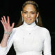 Jennifer Lopez greets the crowd after showing her new Fall 2005 clothing collection at Fashion Week in New York.