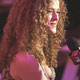 Actress Bernadette Peters talks to the media before the Diane von Furstenberg show at Fashion Week in New York.