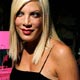 Tori Spelling poses for photographers before the Betsey Johnson 2008 collection during New York Fashion Week