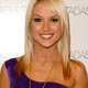 Former Miss USA Conner smiles backstage before theTadashi Shoji Spring 2008 collection show during New York Fashion Week