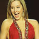 Gymnast Carly Patterson models a dress by Cynthia Steffe as she walks the runway in the Red Dress Collection 2005 Show at New York's Fashion Week.