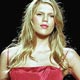 Alexandra Richards models a dress by Betsey Johnson as she walks the runway in the Red Dress Collection 2005 Show at New York's Fashion Week.