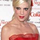 Actress Tori Spelling arrives for the Heart `s Truth Red Dress collection show at New York Fashion Week