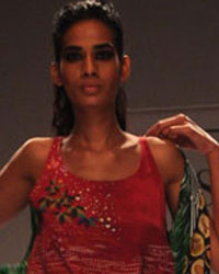 A model displays the creation of Pakistani fashion designer Sania Maskatiya