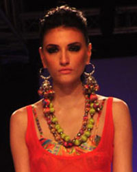 A model displays the creation of Pakistani fashion designers Rizwan Beyg