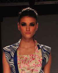 A model displays the creation of Pakistani fashion designer Sania Maskatiya