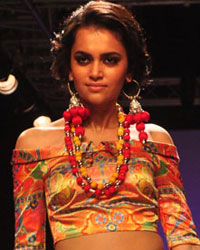 A model displays the creation of Pakistani fashion designers Rizwan Beyg