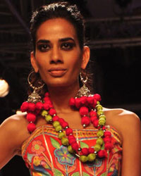 A model displays the creation of Pakistani fashion designers Rizwan Beyg