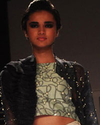 A model displays the creation of Pakistani fashion designer Sania Maskatiya