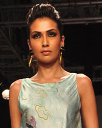 A model displays the creation of Pakistani fashion designer Sania Maskatiya