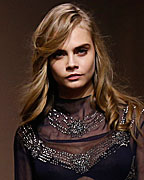 Model Cara Delevingne presents a creation by Ann-Sofie Johansson, Head of Design at H