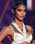 A model presents a creation during the Etam Live Show Lingerie at Bourse du Commerce during Paris fashion week