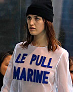 A model presents creations by French designer Simon Porte Jacquemus as part of his Fall-Winter 2013-2014 women's ready-to-wear fashion show during Paris Fashion Week