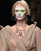 A model presents a creation by British designer Vivienne Westwood as part of her Fall-Winter 2013-2014 women's ready-to-wear fashion collection during Paris Fashion Week